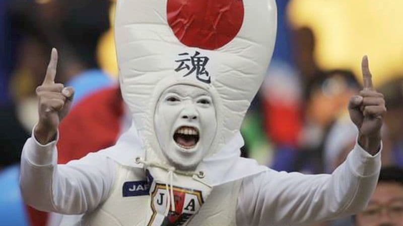 Fans cheer Japan as giant bowling pins (CNN, Will Ripley)